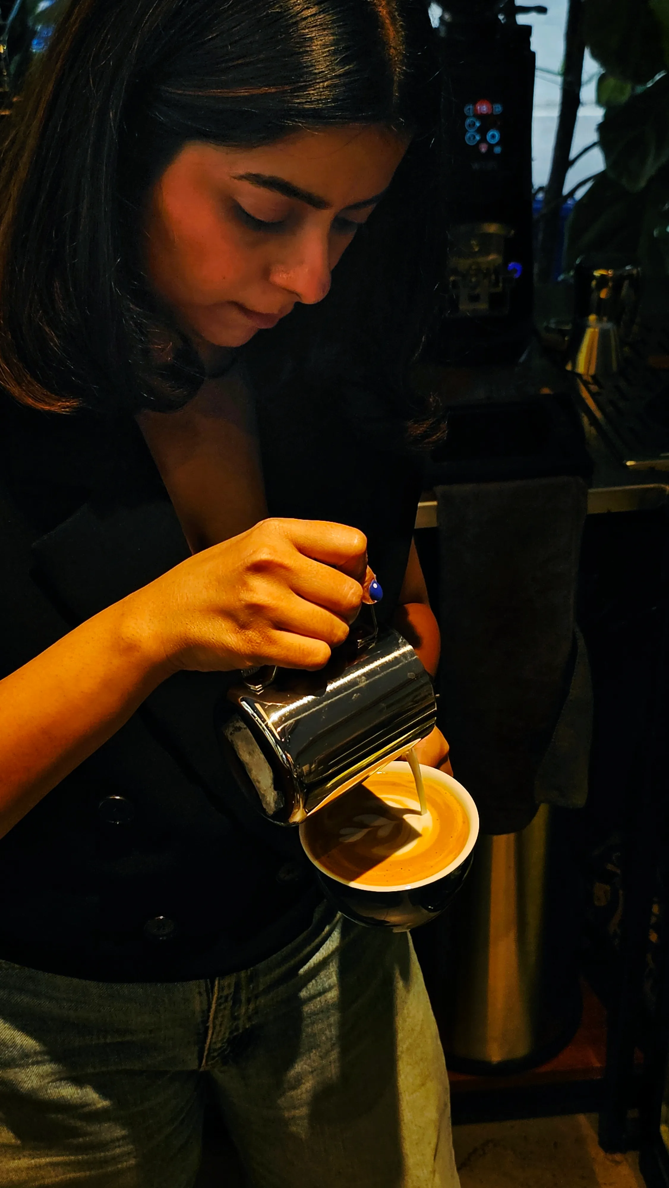 A creamy milk-based coffee at Juno Coffee Club