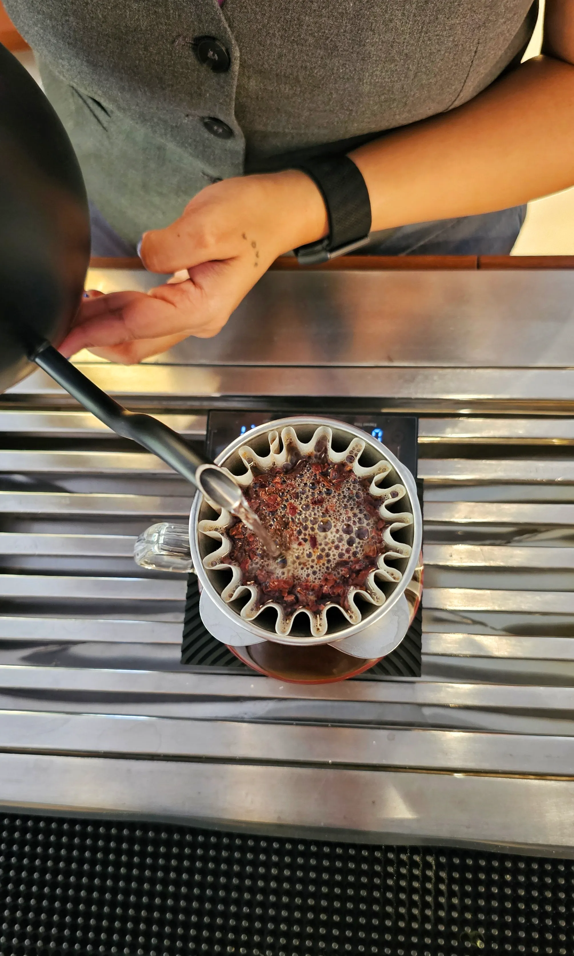 Pour-over coffee being poured at the Juno pour-over bar