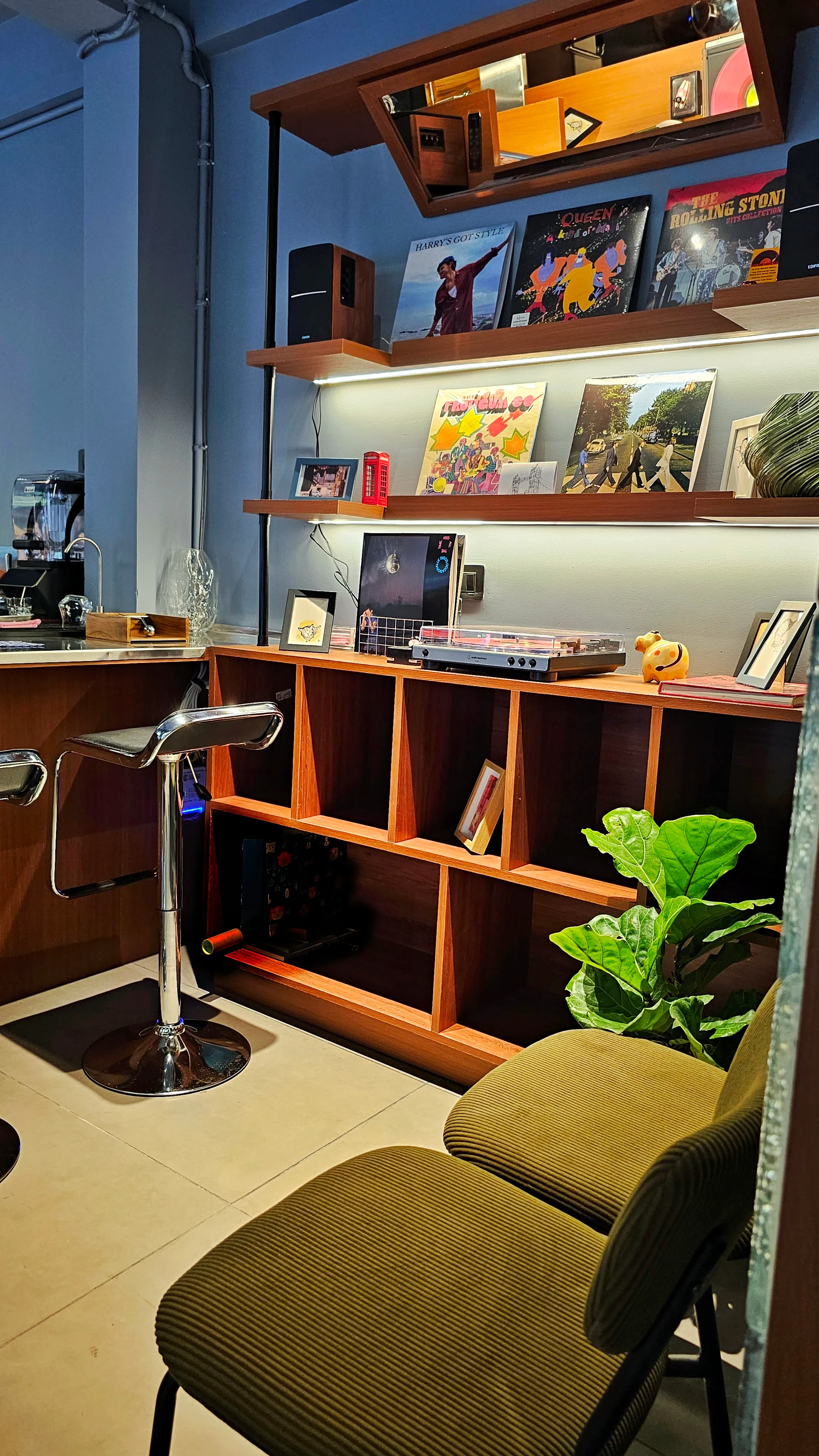 Record corner with a chair at Juno Coffee Club